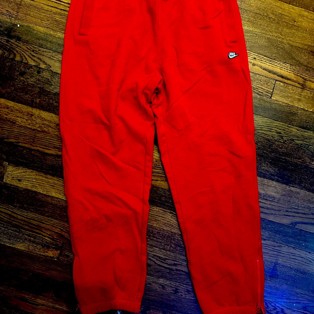 Red Nike Sweat pants.